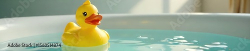 Cheery Yellow Rubber Ducky Ready for a Bathtime Adventure in a Sparkling Tub