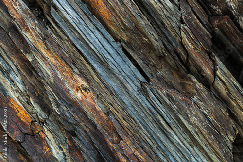 Weathered layered rock texture close-up