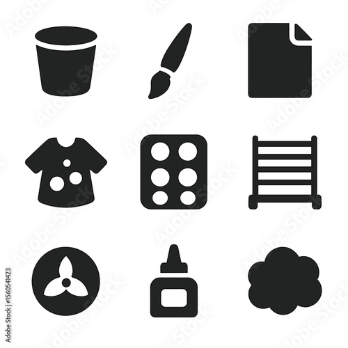 Kids' Art Tool Icons. Solid, filled icon set of art class tools for kids: water cup, paintbrush, paper sheet, smock, paint dots,