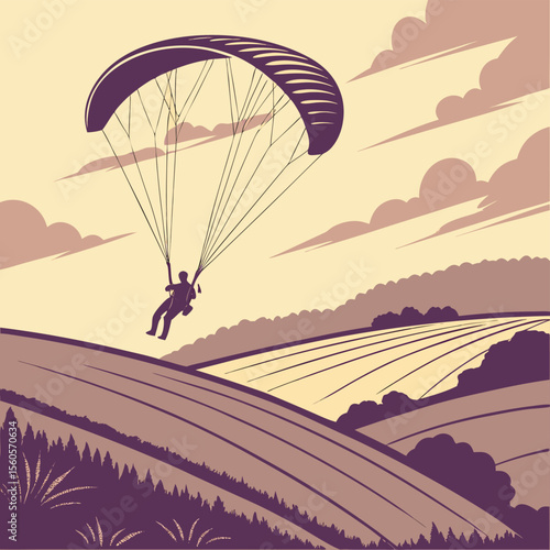 Silhouette of a paraglider soaring above the landscape with fields and trees under a cloudy sky view