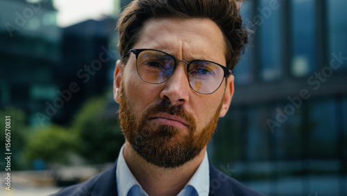 Wallpaper Mural Portrait sad upset failure tired exhausted stressed Caucasian man businessman business male guy manager employer entrepreneur boss leader in city outdoor looking at camera in glasses corporate problem Torontodigital.ca