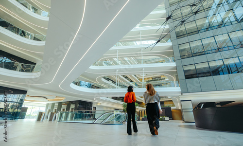 Canvastavla Modern finance professionals walking through sleek lobby