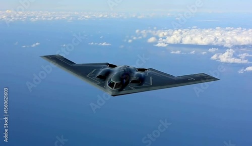 Stealth Bomber B-2 Spirit Flying High Above Ocean Clouds Aerial View Powerful Military Aircraft