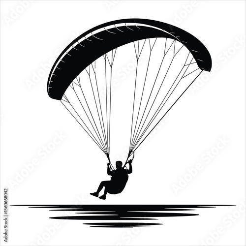 a paraglider in mid-flight over the sea , the paraglider’s canopy is wide and curved, clearly showing the arch shape