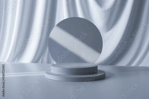 Minimalist circular podium scene with round platforms and soft fabric backdrop ideal for high-end product mockup presentation
