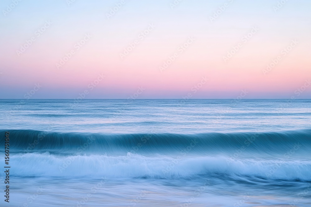 Obraz premium Tranquil ocean waves at sunrise/sunset, soft pastel colors