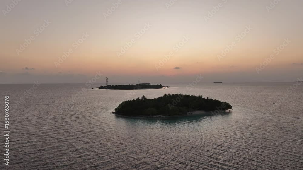 Aerial view of islands with lush vegetation, Maldives. Aerial view of islands with lush vegetation, Maldives.
