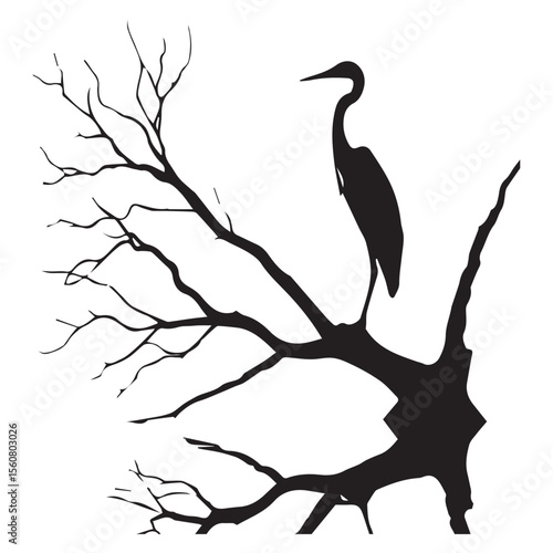 Silhouette of a heron standing on a bare tree branch against a white background