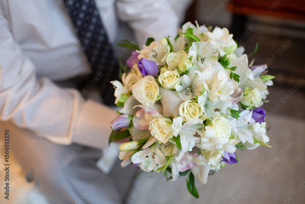Groom Holding Elegant Wedding Bouquet Groom Holding Elegant Wedding Bouquet