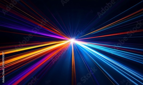 Abstract dark background of light with stripes of colorful rays moving from the center. Acceleration speed of motion on a night road. Light and stripes move quickly over a dark background.