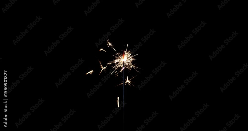 Lightening sparkler on the black background. Sparkler concept. Bengal lights are burning on a black background. Holiday party concept. New year party sparkler. Slow motion. Lightening sparkler on the black background. Sparkler concept. Bengal lights are burning on a black background. Holiday party concept. New year party sparkler. Slow motion.