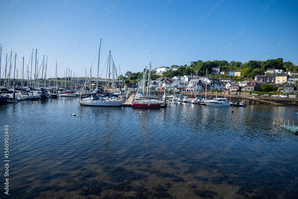 Kinsale Bay and Harbor looking at the coastline where boats sail and the village people are connected to the ocean by a maritime culture with Kinsale Bay and Harbor looking at the coastline where boats sail and the village people are connected to the ocean by a maritime culture with