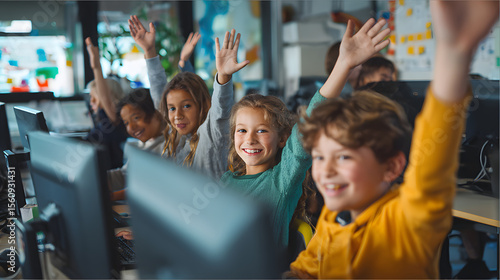 group of smiling kids using computers in a school tech room with colorful decor