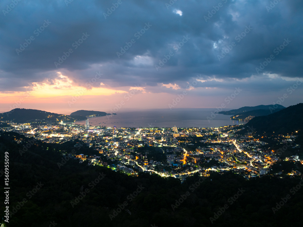 Obraz premium Aerial view of beautiful sunset sky over sea at Patong bay Phuket city Thailand