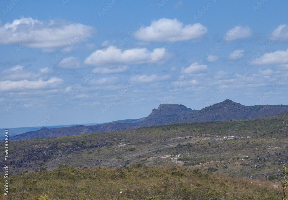 Naklejka premium mountain landscape with blue sky and clouds
