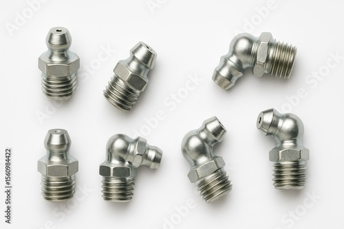 Six grease fittings two straight and four 90 degree angled metallic on white background