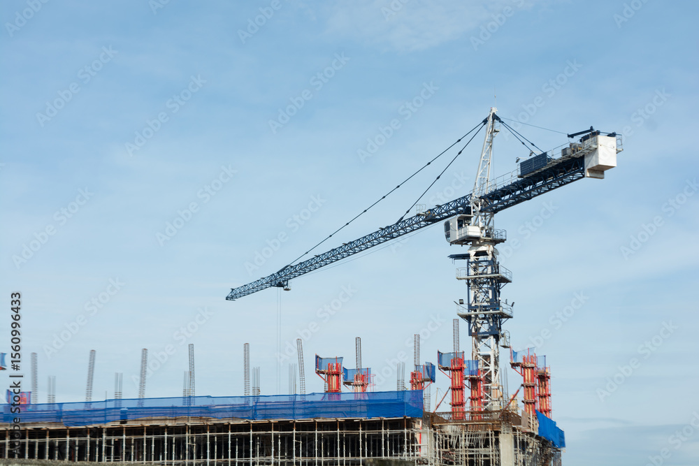 Fototapeta premium Building construction using tower crane