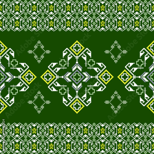 Green cross-stitch ethnic seamless pattern. Ukrainian embroidery. Folk ornament. Pixel pattern. Ideas for wallpaper, elaborate borders, textiles, wrapping, and web page backgrounds.