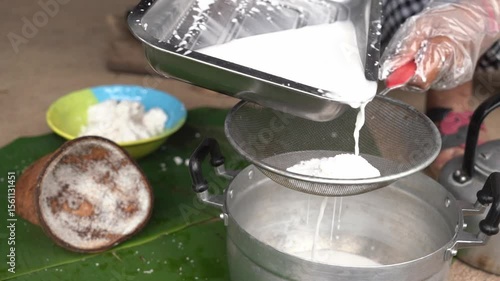 Antique and traditional wooden coconut grater, scraped by hand
