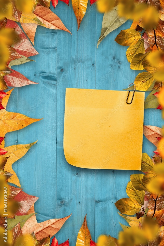 Fototapeta premium Autumn leaves with yellow note