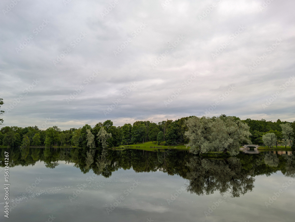 Fototapeta premium Clouds over the lake