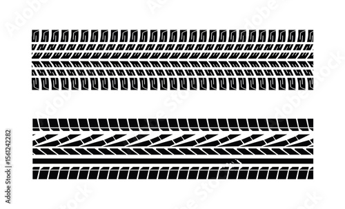 Black tyre tracks on white background