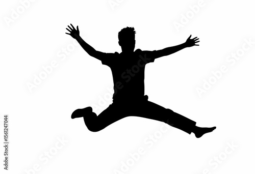 Silhouette of a joyful man jumping with arms outstretched in excitement  