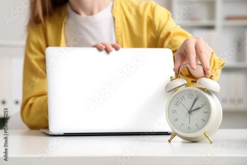 Businesswoman managing time...