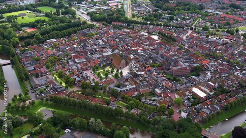 An panoramic Aerial view of the old town of the city Dokkum in the Netherlands on a cloudy morning in summer