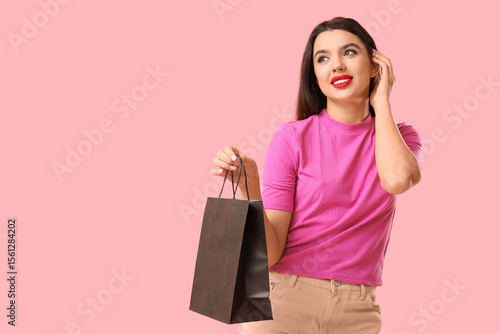 Beautiful young woman with ...