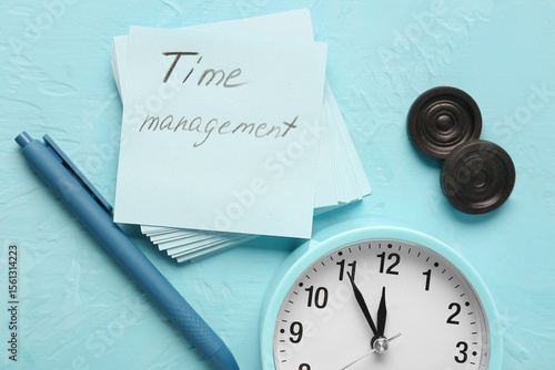 Paper with text TIME MANAGE...
