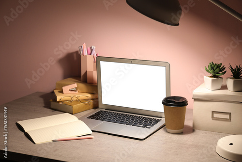 Workplace with modern lapto...