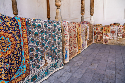 Uzbek carpets and ornaments on the streets of Bukhara