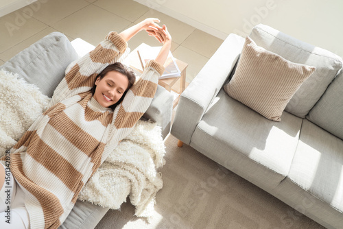 Young happy woman resting o...