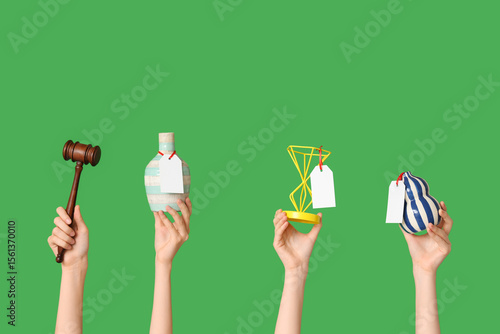 Female hands with auction g...