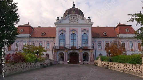 Stunning morning view of Royal Palace of Godollo. Beautiful autumn scene of Godollo - city in Pest County, Budapest metropolitan area, Hungary, Europe. 4K video (Ultra High Definition).