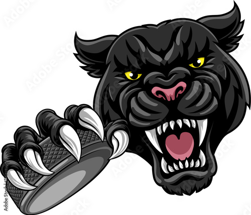 Black panther leopard or jaguar cat hockey sports team mascot holding an ice hockey puck