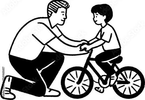 Father teaching child to ride a bicycle - heartwarming learning moment