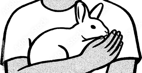 Gentle moment of a person cradling a rabbit in cuddling embrace