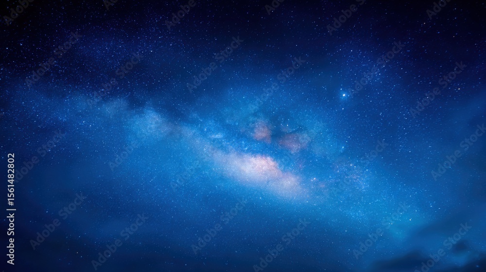 Fototapeta premium Stunning view of the Milky Way galaxy in the night sky with vibrant stars and cosmic dust.