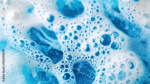 Wallpaper Mural Blue liquid with bubbles and foam creating a textured, abstract pattern. Torontodigital.ca