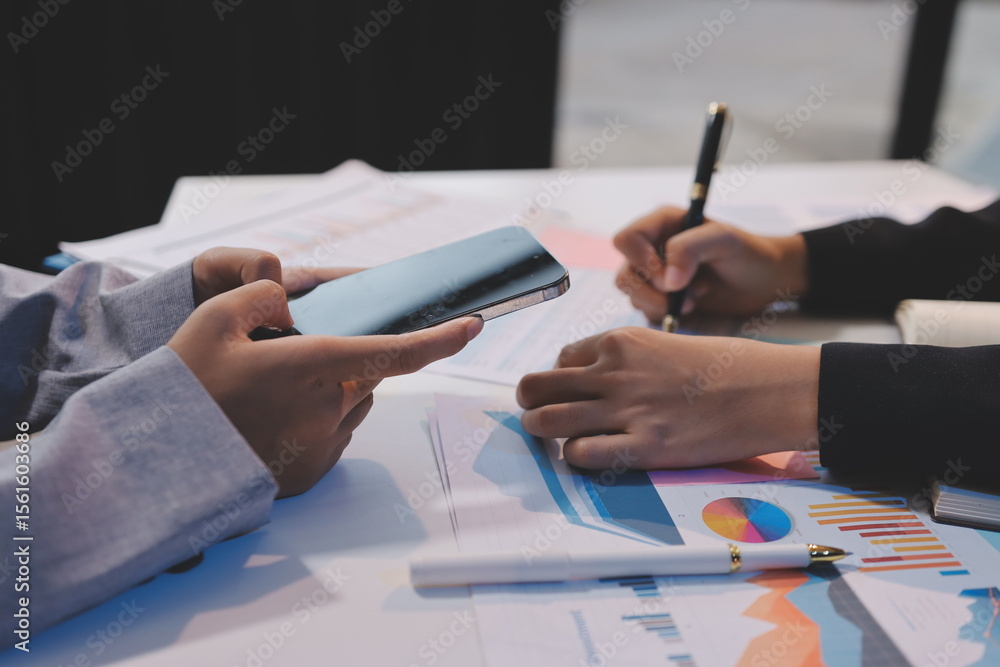 Fototapeta premium Team of business people working together in the meeting room office, teamwork background charts and graphs banner, double exposure successful teamwork,business planning concept.