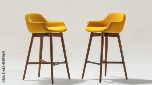 Yellow bar stool with wooden legs and simple design