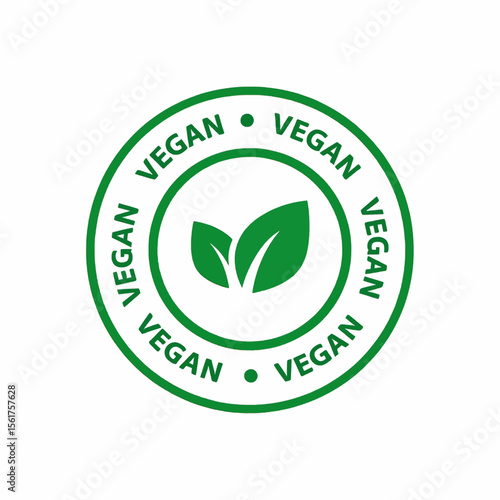 Green vegan symbol with leaves inside a circle and vegan text around