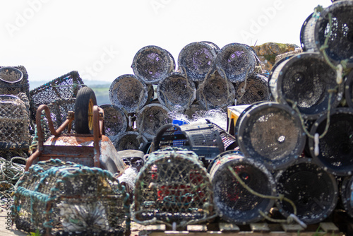 Crab pots stacked up in a harbor
