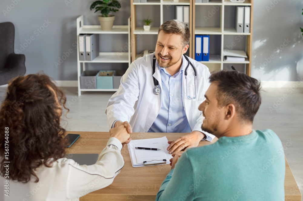 Obraz premium Doctor meeting, congratulate consulting happy couple patients in fertility clinic, offering help, giving medical advice, professional clinician talking to husband, wife, planning pregnancy, test check