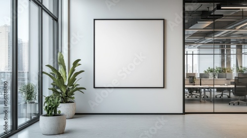 Modern office corner with blank poster