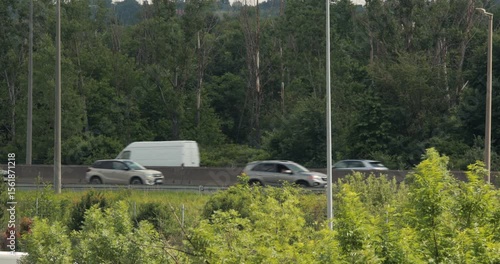 Wallpaper Mural Cars driving on a highway, moderate traffic Torontodigital.ca