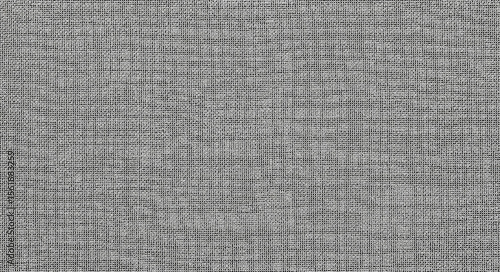 Fototapeta premium Gray Fabric Texture: Close-up shot showcasing the intricate woven pattern of a gray fabric, highlighting its texture, weave, and subtle variations in tone.