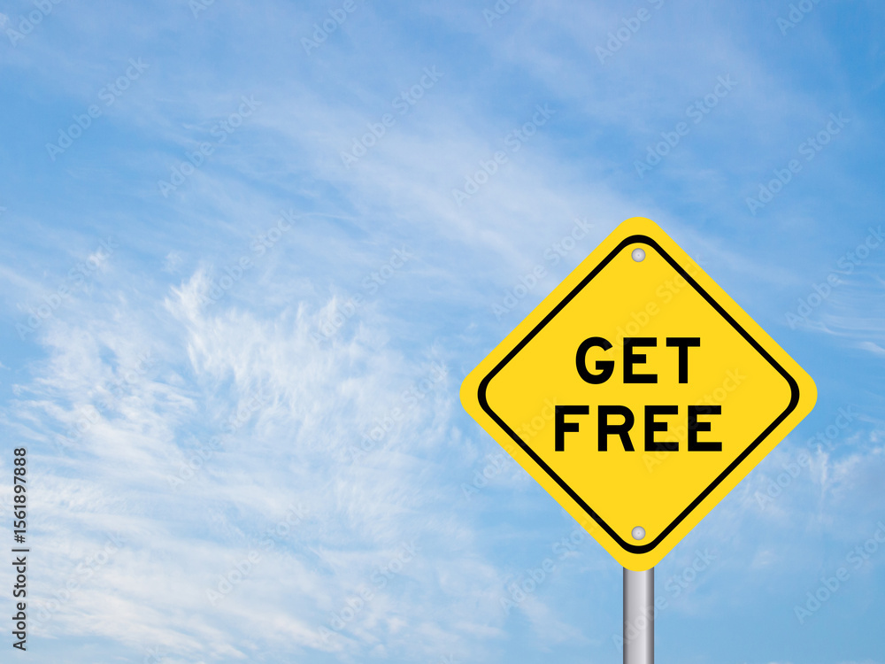 Yellow transportation sign with word get free on blue color sky background Yellow transportation sign with word get free on blue color sky background
